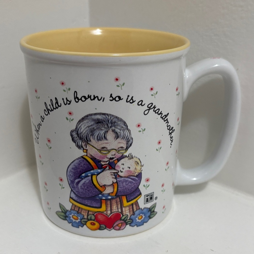 “When a child  is born, so is a grandmother” Mug